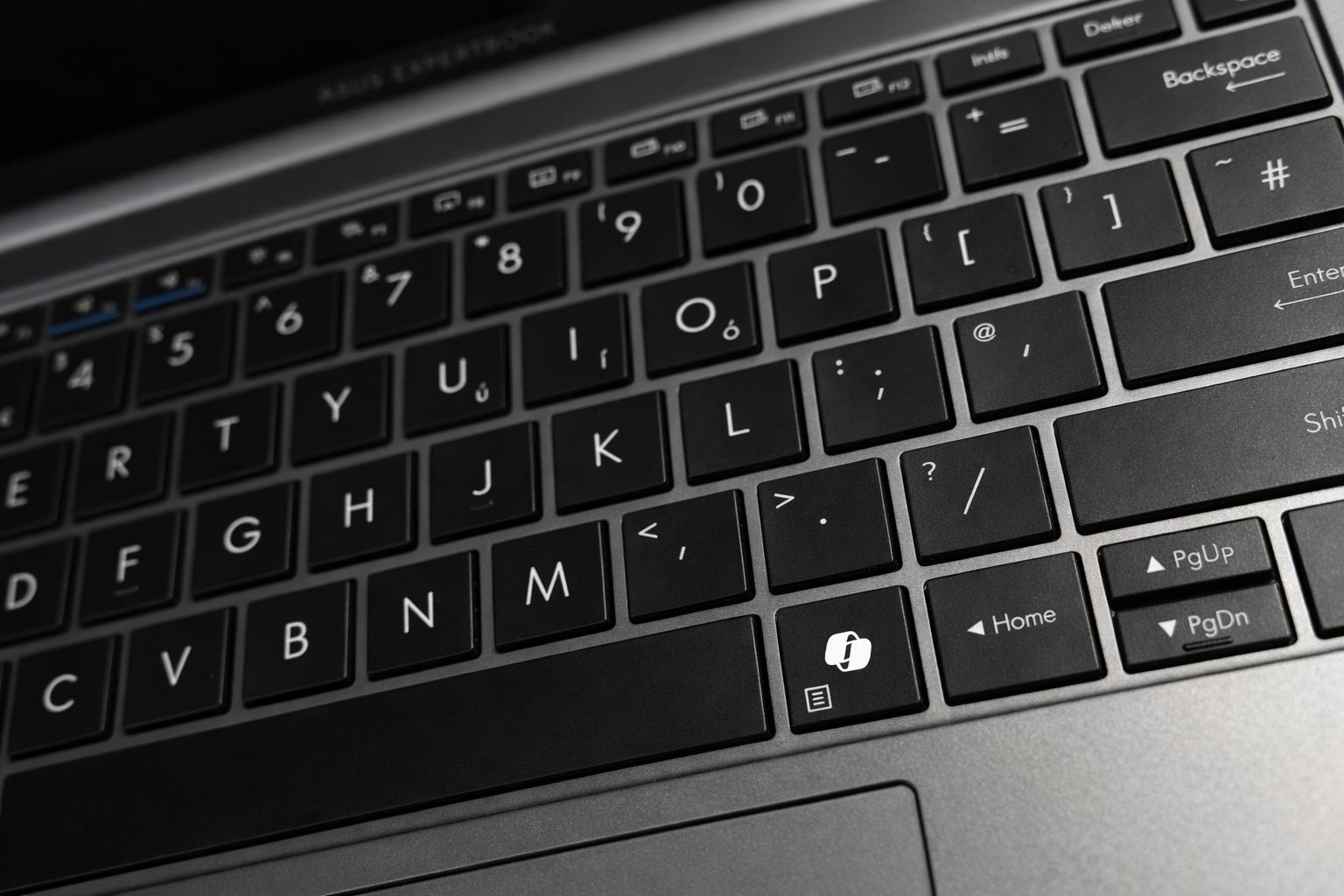 What does the Copilot button on my laptop keyboard do?